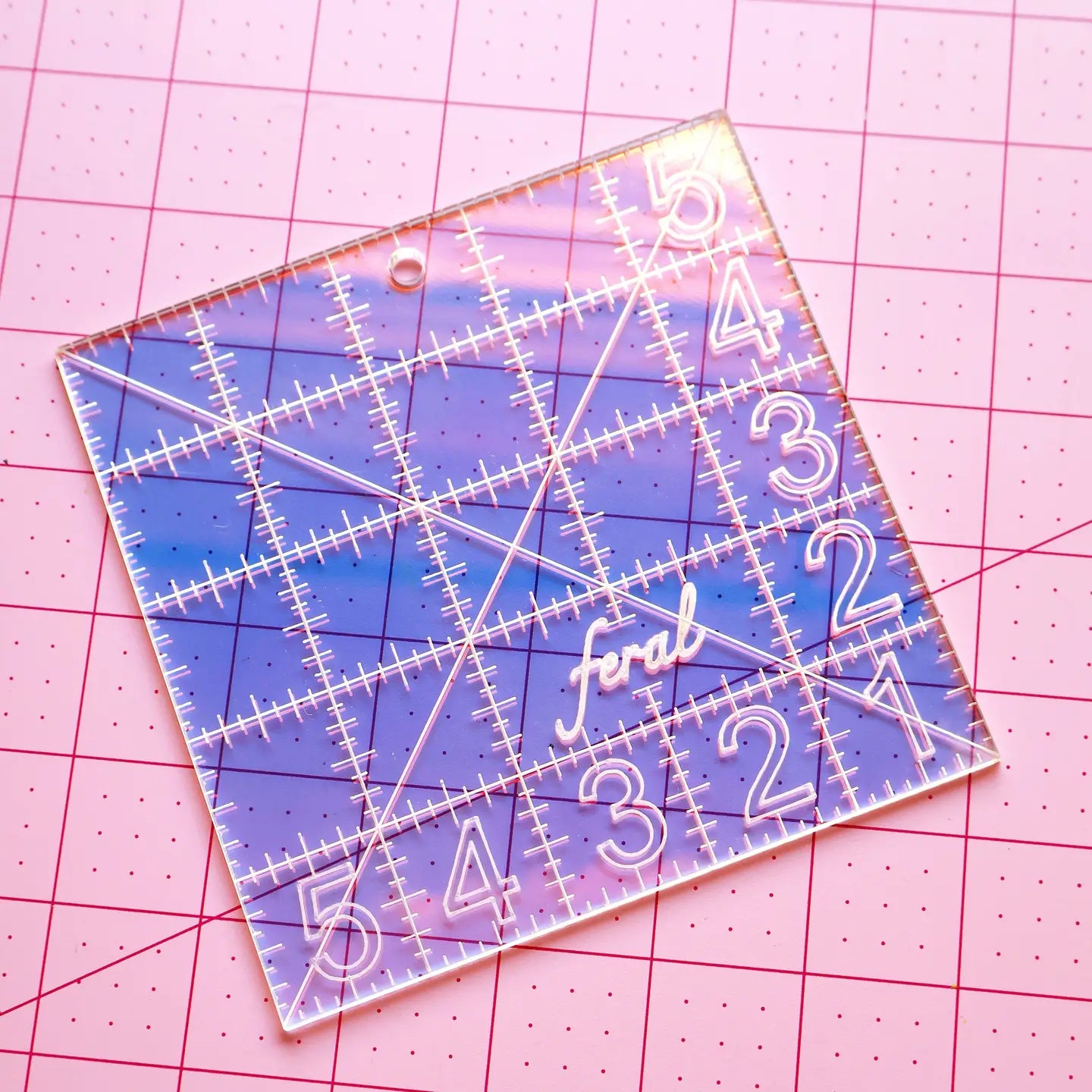 5 inch square acrylic ruler by Feral Notions in Iridescent colorway for needlepoint finishing projects