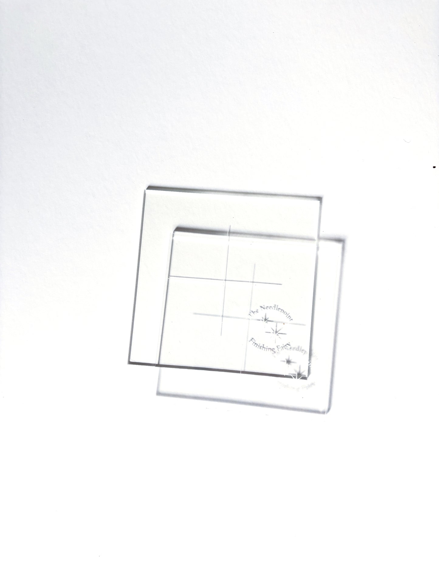 Square arylic needlepoint finishing templates for tracing matboard, shown as a set of two including front and back template sizes for beginner finishing projects